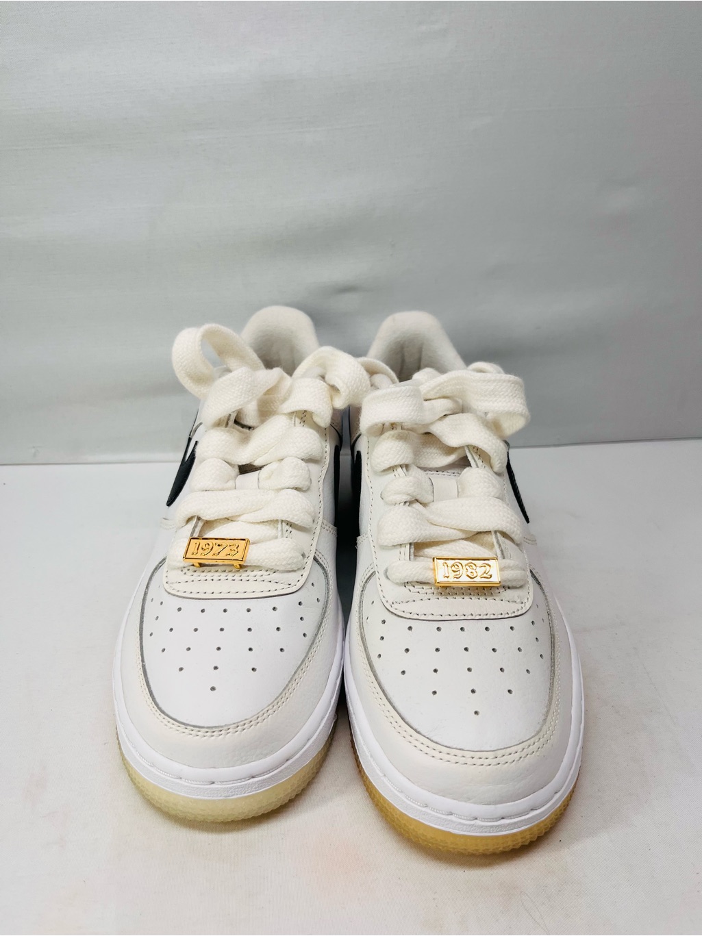 Nike Air Force One White Athletic Sneakers With Gold Lace Tags